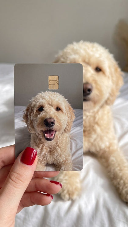 A personalized card sticker held up