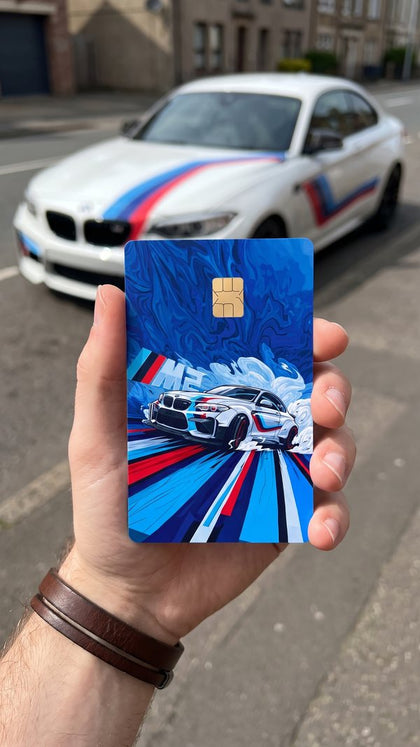 A personalized card sticker held up